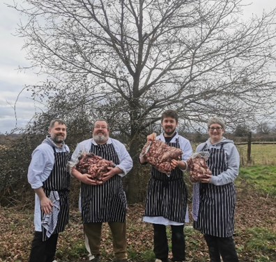 Knepp Wild Range butchery team holding stork food